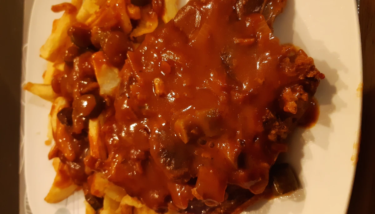 Côtes de porc à la tomate et cornichons