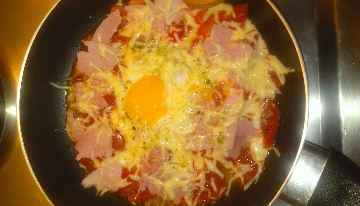 Oeuf au plat et sa compotée de tomates