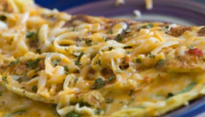 Omelette courgette-tomates