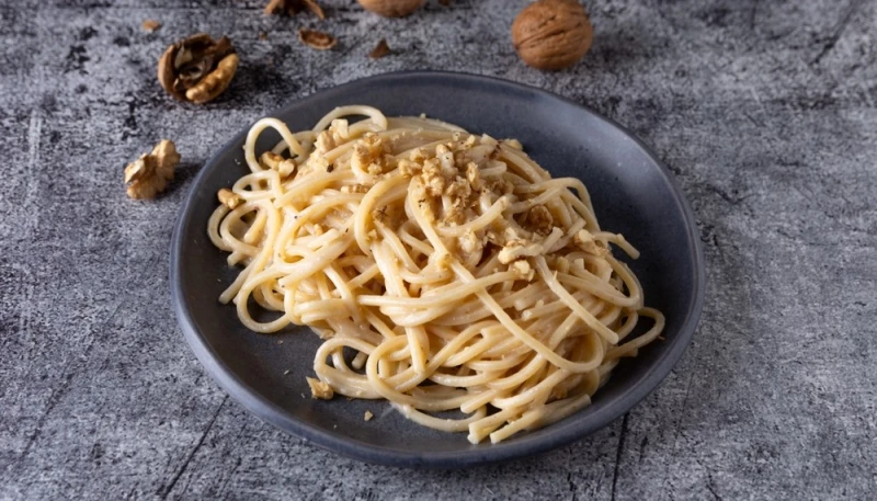 Spaghetti à la crème de potimarron et noix