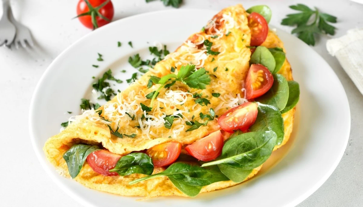 Omelette aux herbes et légumes du frigo